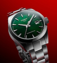 Green dial Gentleman watch on red background image