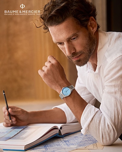Baume & Mercier Logo with Watch on a wrist image