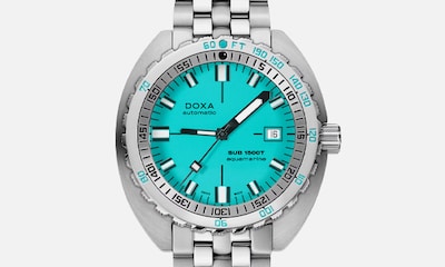 DOXA Sub 1500T Carbon with turquoise dial. Tap to shop the collection image