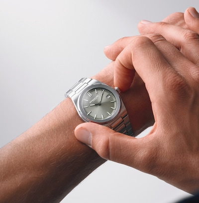 Image of hand with a Raymond Weil watch image