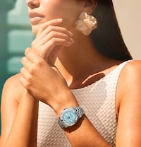 Image of female model wearing Tudor watch. Tap to shop all ladies tudor watches image
